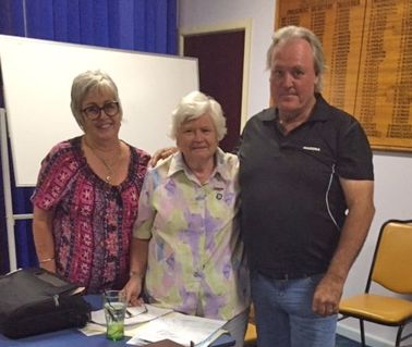 Cheryl Harris (centre) being presented with life membership of the Manilla Fishing Club